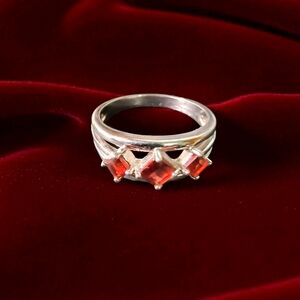 Garnet And Sterling Silver Triple Shank Classic Ring